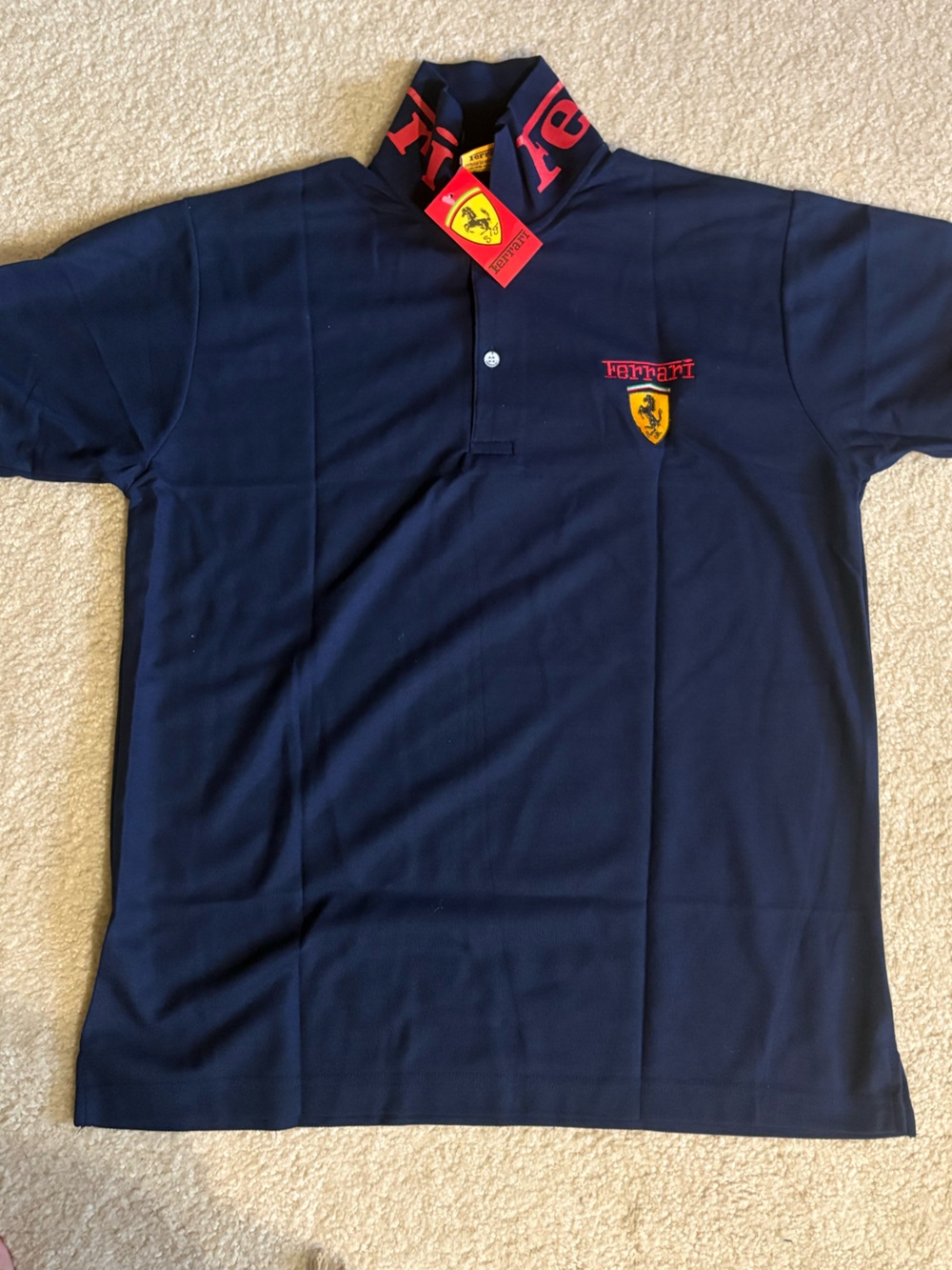 New with tag (sz XL FIT L )Ferrari Navy Polo with Yellow Shield and Red Accents